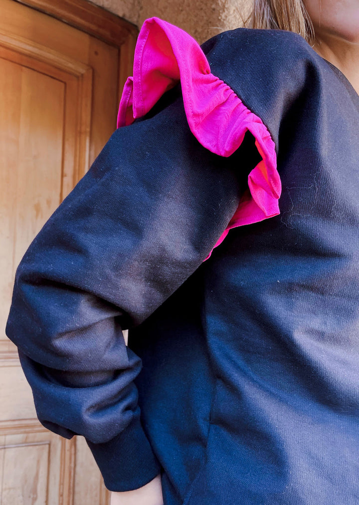 Polerón Mara | Negro + Fucsia